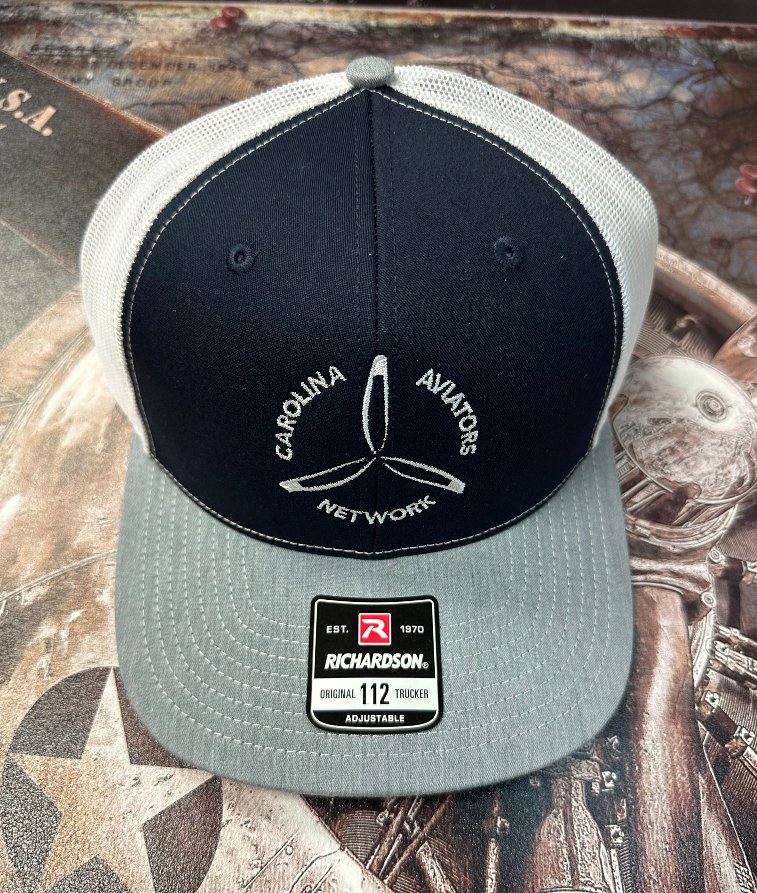 Richardson 112 hat with 2026 CAN logo